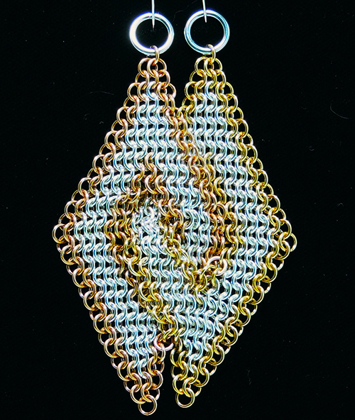 Chainmail diamond earrings designed by Quinn Palan